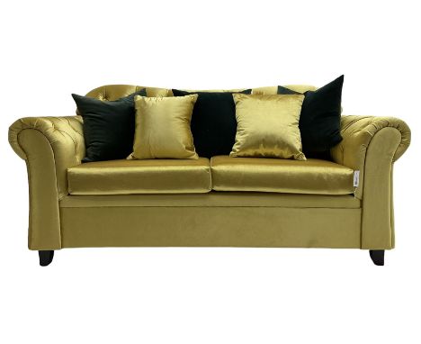 Chesterfield shaped two seat sofa, upholstered in buttoned gold fabric, with scatter cushionsDimensions: Height:&nbsp;89cm&nb