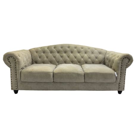 Chesterfield style three seat club sofa, upholstered and buttoned in cream fabric with stud workDimensions: Height:&nbsp;86cm