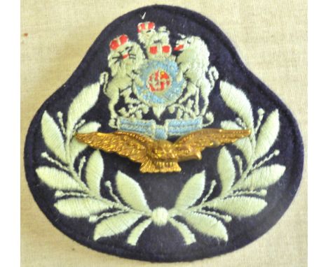 British RAF Master Aircrew sleeve patch, cloth patch with metal insignia, an excellent example.
