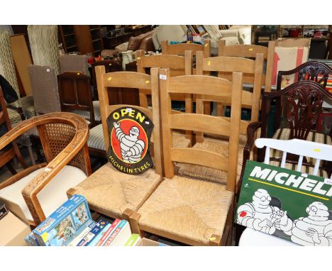 A set of six beech rough seated ladder back chairs