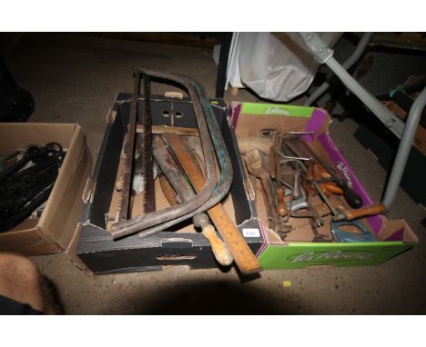 Two tray boxes and contents of various tools to include bow saws, hand saws, mallets, wooden measure etc.