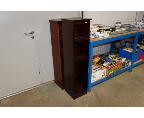 Two stained pine narrow shelf units