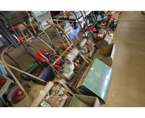 An Atco Greensman mower with grass collection box and manual