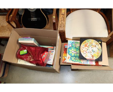 Two boxes containing vintage and other games and puzzles