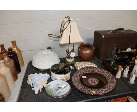 A pottery charger, a Burleigh ware wall pocket, German porcelain wall pocket, collectors plates, a table lamp, door furniture