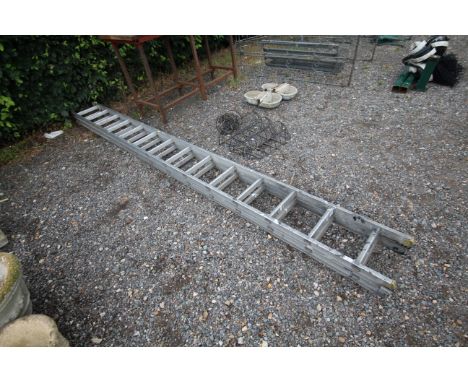 An aluminium double extending ladder