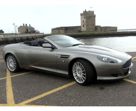 This handsome Volante is presented in Gunmetal Grey and trimmed in Black hide. It comes complete with Aston Martin service hi