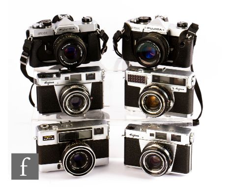 A collection of Fujica cameras 325mm rangefinder cameras, to include two 35ML, 35SE, two STXI, Auto M. 