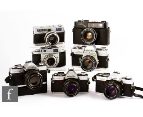 A collection of Minolta 35mm rangefinder cameras, to include SRT 101, two XG – 9, AL-S, XG-1, A, 7s. 