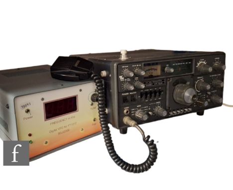 A Yaesu FT101ZD HF Transceiver, with microphone and leads and squelch modification to case, with manual and a Digital VFO for