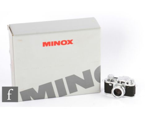 A boxed Minox classic camera Leica IIIf.