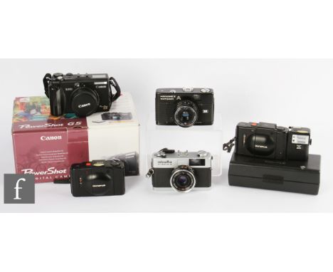 A collection of compact cameras, to include a boxed digital Powershot G5, a Minolta Hi-Matic G, a Hamimex compact A, an Olymp