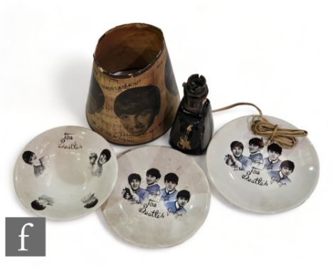 A group of Beatles collectibles to include an original 1960s lamp shade and two Beatles plates and a bowl, some damage. (4) 