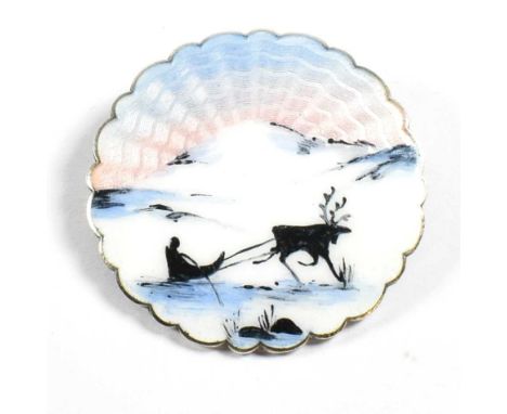 A Norwegian silver enamel winter scene brooch pin. The brooch pin with guilloche enamel decoration of a reindeer pulling a sl