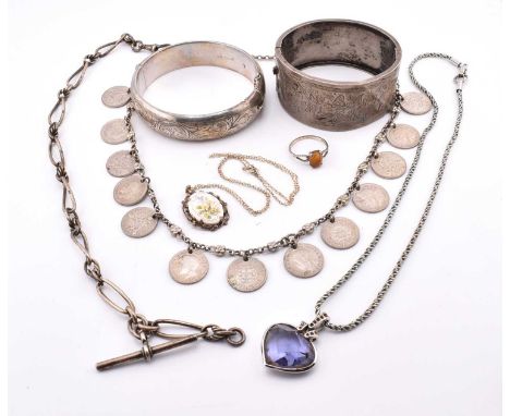 A collection of silver jewellery and Swarowski necklace. The lot to include a silver engraved hinged bangle with concealed bo