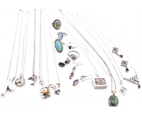 A collection of silver and gem set jewellery including necklaces, rings and earrings. The necklaces to include a hallmarked s