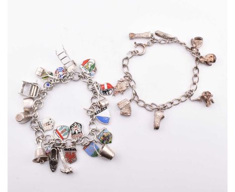 Two silver charm bracelets. The bracelets to include a silver curb link bracelet strung with seven charms including a boot, a