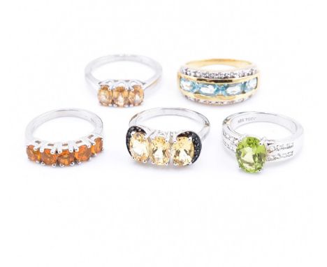 A collection of 925 silver gem set rings. The rings to include Ratanakiri blue zircon and white topaz ring, 5.01g, size N. An