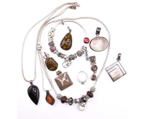 A collection of silver jewellery including Pandora. The lot to include a Pandora Moments silver snake chain charm necklace st