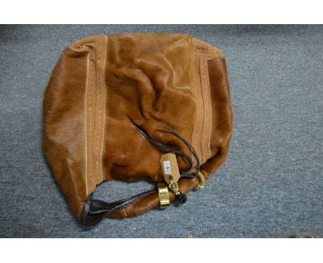 A Jimmy Choo handbag.