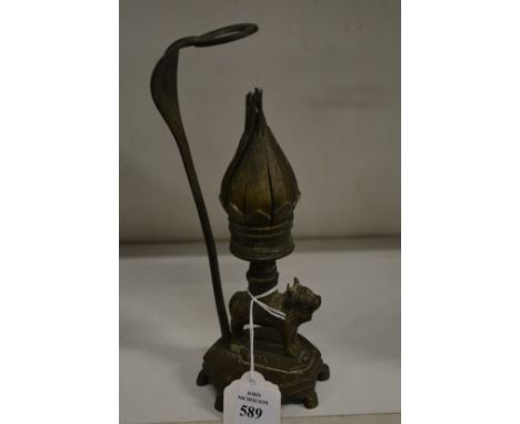 An unusual eastern brass lamp.