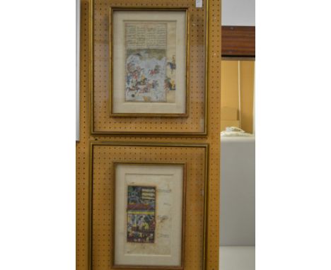 Two decorative Indian illuminated manuscript pages, framed and glazed.
