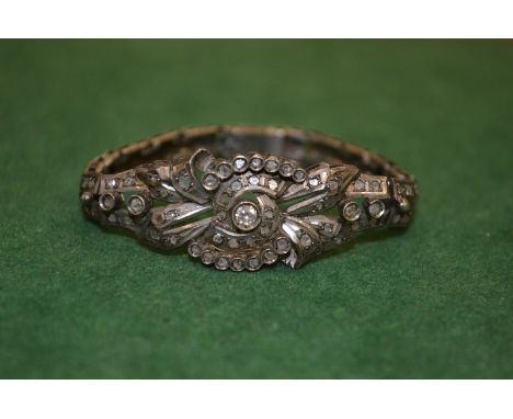 A diamond set bangle.