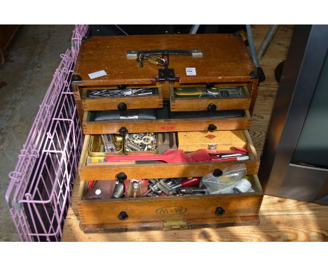 An M &amp; W tool cabinet containing numerous tools, micrometers etc.