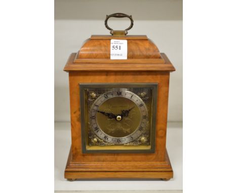 A small walnut cased bracket clock by Mappin &amp; Webb.