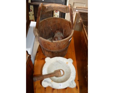 A pestle and mortar, a Chinese bucket and a lamp.