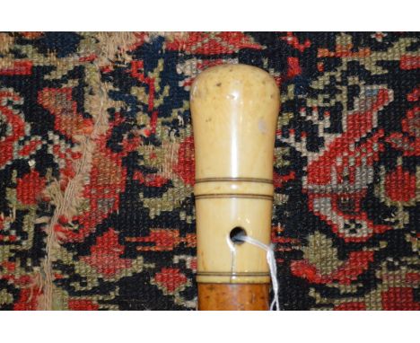 A Georgian malacca walking stick.