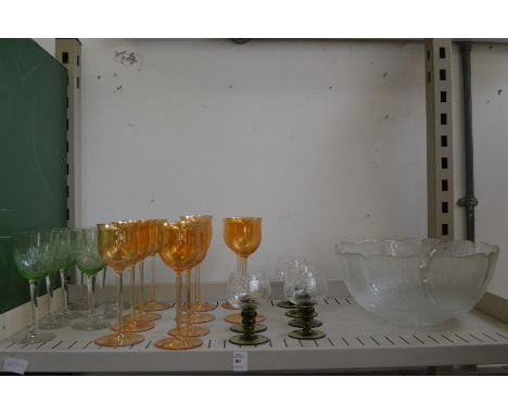 A shelf of glassware.