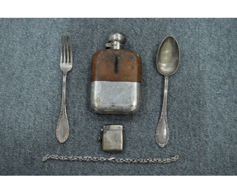 A silver vesta case, a hip flask and other items.