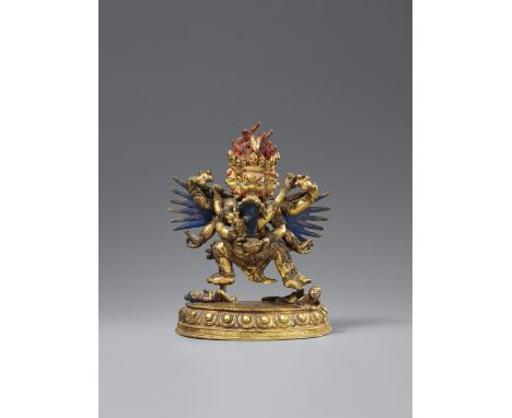 Hayagriva in yab-yum. Feuervergoldete Bronze. Sinotibetisch. 19. Jh.Der sechsarmige geflügelte Dharmapala mit drei Köpfen ums