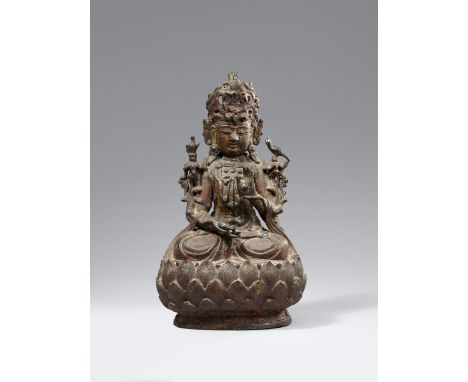Figur des Guanyin. Bronze. Ming-Zeit, 17. Jh.Im Meditationssitz auf einem großen Lotossockel, beide Hände in mudra, aus den H