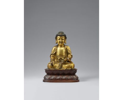 Medizin-Buddha Bhaishajyaguru. Bronze, vergoldet. Ming-ZeitIm Meditationssitz, die rechte Hand mit einer Myrobalanen-Frucht z
