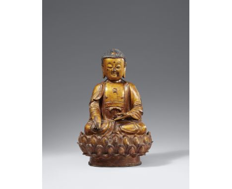 Medizin-Buddha Bhaishajyaguru. Bronze. Ming-Zeit, 16./17. Jh.Im Meditationssitz auf einer Lotosblüte. Die rechte Hand ruht au