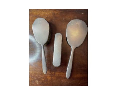 ART DECO HALLMARKED SILVER DRESSING TABLE SET
A stylish, English hallmarked silver dressing table set circa 1930s. Mirror, or
