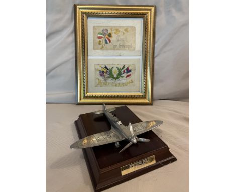 MILITARIA - 2 WW2 SILK POSTCARDS WITH PEWTER SCULPTURE OF A SPITFIRE&nbsp;
2 framed WW2 silk post cards (foxed) with a pewter