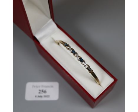 Pretty 9ct gold diamond and sapphire set hinged lattice design bangle.  Boxed.  4.2g approx.  (B.P. 21% + VAT) 