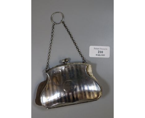 Edwardian design silver engine turned ladies' purse with chain and ring holder.  (B.P. 21% + VAT) 