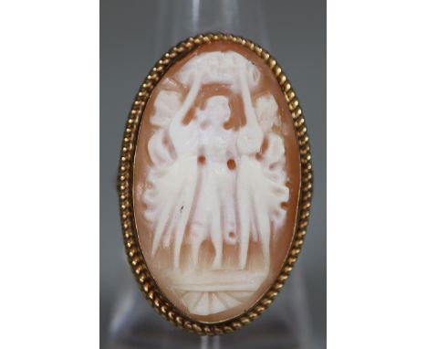 9ct gold boat shaped cameo dress ring decorated with study 'The Three Graces'.  5.8g approx size I.  (B.P. 21% + VAT) 