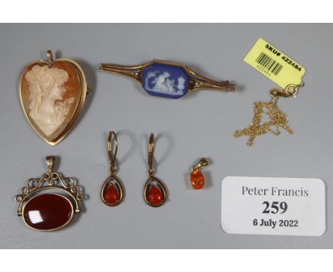 Gold framed heart shaped portrait cameo pendant, a gold spinning fob, a jasperware gold framed pin brooch earrings etc.  (B.P