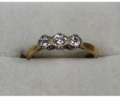 18ct gold 3 stone illusion set diamond engagement ring 3g approx size P. Cased.    (B.P. 21% + VAT) 