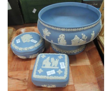 Three pieces of Wedgwood blue and white Jasperware, to include: a large pedestal bowl, and 2 lidded trinket/pin dishes.  (3) 