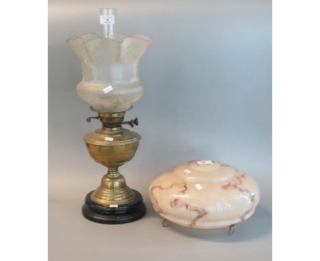 Early 20th century double oil burner lamp with frosted and etched shade and brass reservoir, together with an Art Deco style 