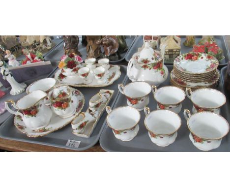 Two trays of Royal Albert 'Old Country Roses' tea ware, to include: six teacups and saucers, six tea plates, teapot, two suga