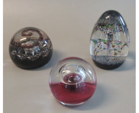 Three Caithness glass paperweights to include 'Alien', 'Space Beacon' and another in original boxes (3)(B.P. 21% + VAT) 