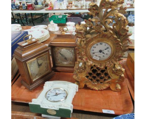 Tray with four mantel clocks, a pair of modern, oak cased Elliot clocks with Roman numerals and reticulated hands.  A Regency
