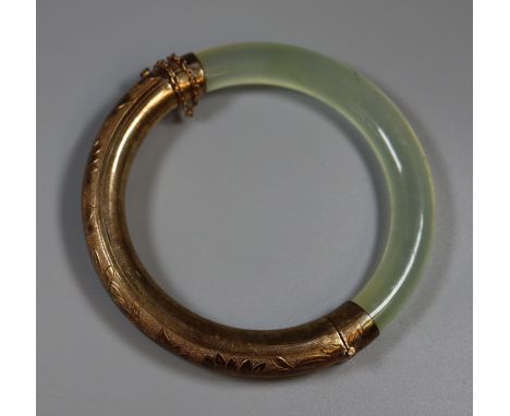 Engraved silver and hard stone hinged bangle.(B.P. 21% + VAT) 